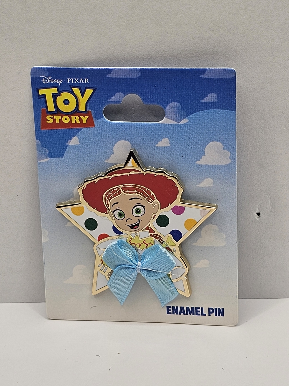 Disney Pixar Toy Story Jesse Gold Star Pin with Light Blue Satin Ribbon